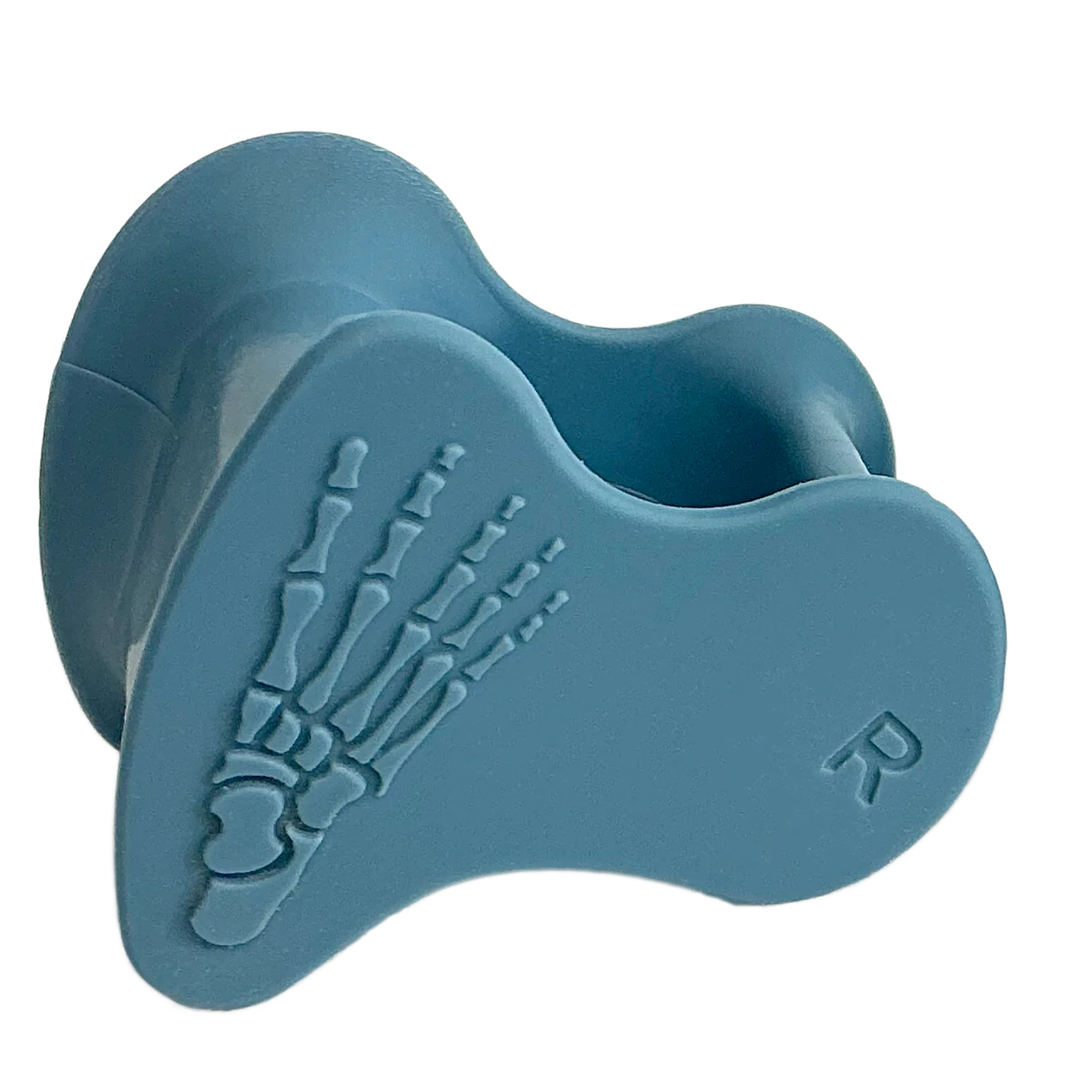 Ett par blå tåspridare från Stabletoe med anatomisk design, märkta med 'R' och 'L' samt skelettillustrationer för höger och vänster fot.