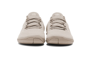 Xero Shoes Nexus Knit Silver Lining – stilren barfotasko i stickad beige mesh med bred tåbox, flexibel yttersula och noll drop för naturlig fotrörelse i vardagenXero Shoes Nexus Knit Silver Lining – stilren barfotasko i stickad beige mesh med bred tåbox, flexibel yttersula och noll drop för naturlig fotrörelse i vardagen