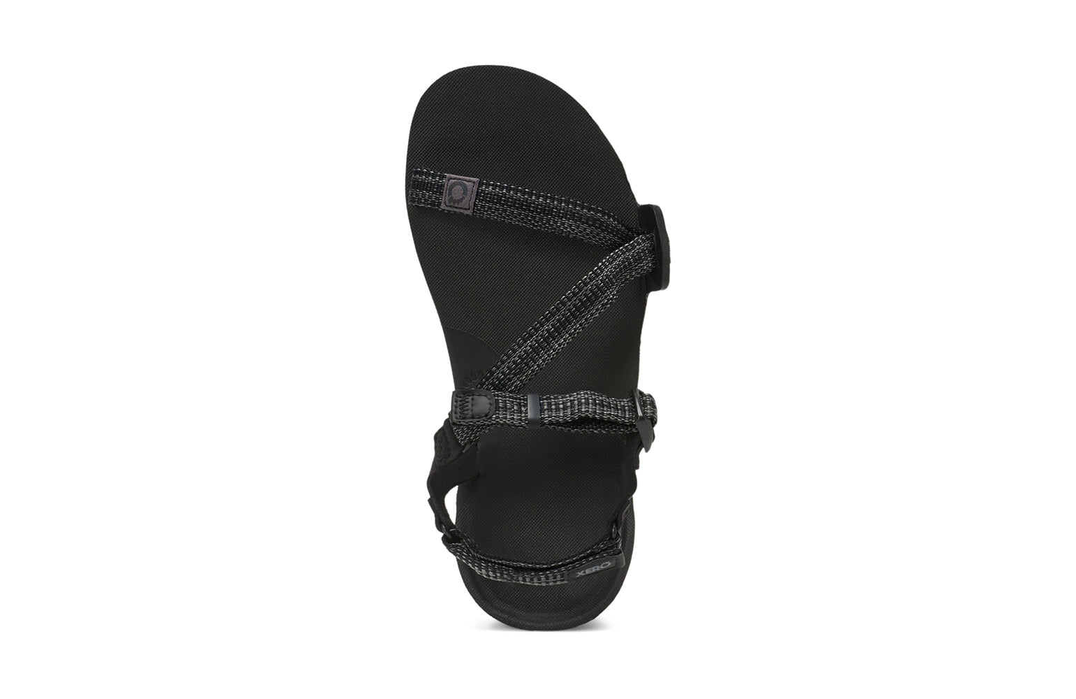 Produktbild av Z-Trail EV sandalen från Xero Shoes i färgen Multi-Black – visar hälremmens design och den strukturerade yttersulan med greppvänligt mönster.